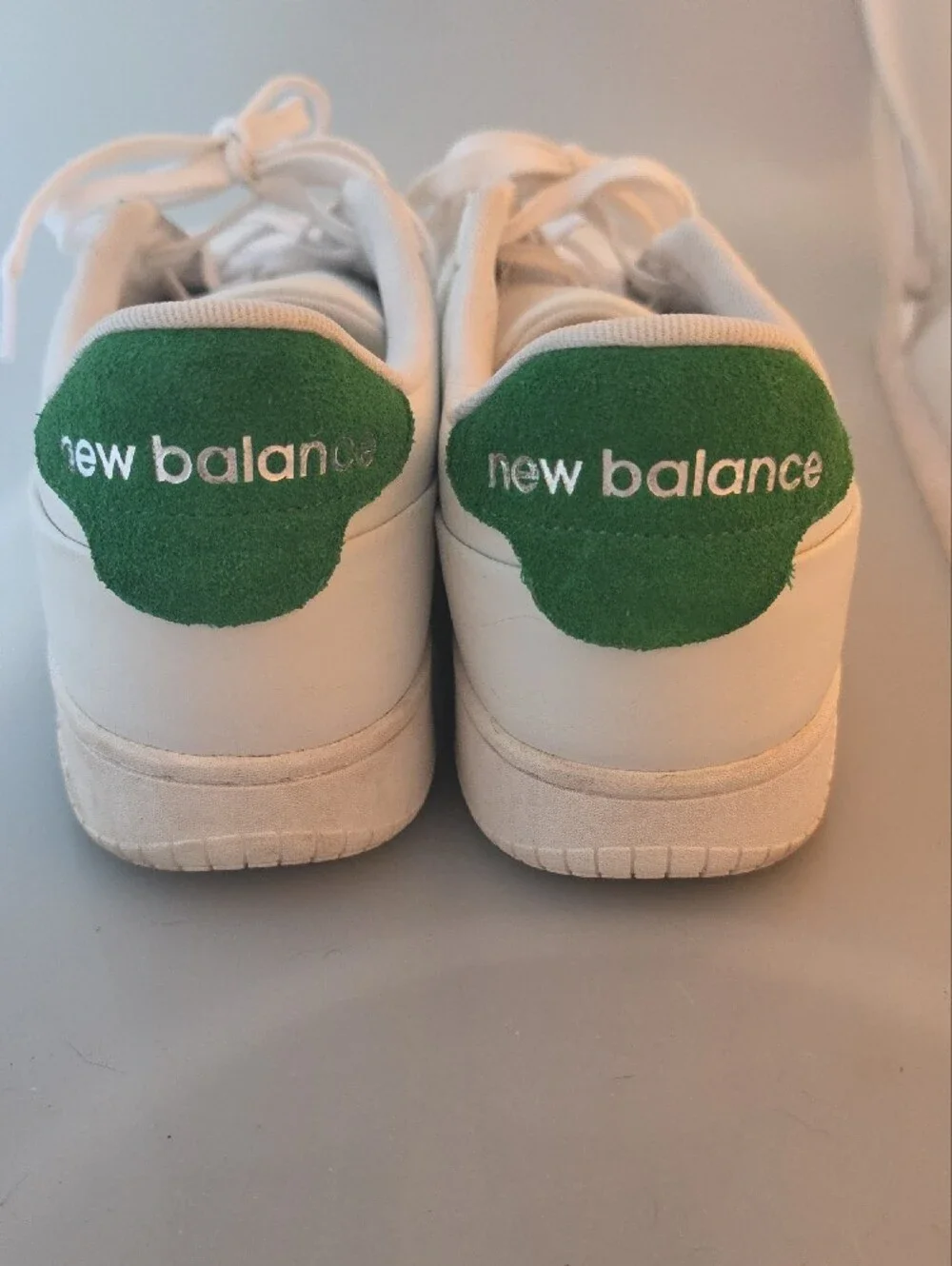 New Balance White Sneakers with Green Heel Accent